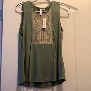 Francescas shirt size small. Never been worn